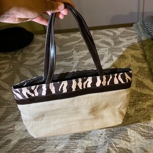 Women bags 💼 . Good condition, color cream, and brown.